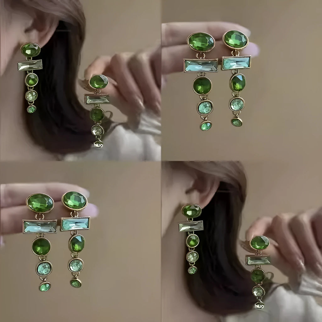 A pair of women's green gradient alloy drop earrings with a geometric tassel design and inlaid zircon stone.
