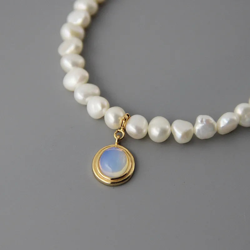 Geometric round medal pearl necklace with irregular freshwater pearls on adjustable silver chain