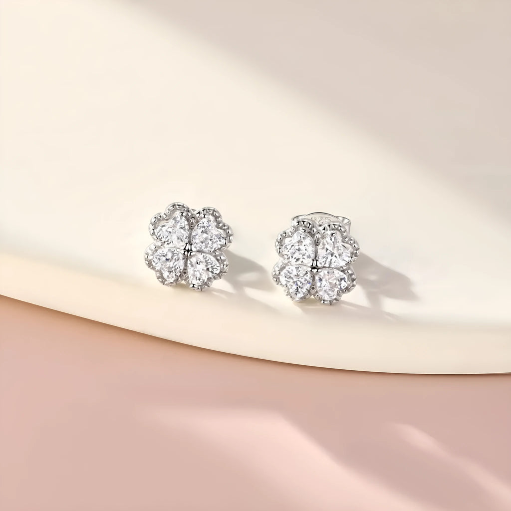 Women's sterling silver heart-shaped four-leaf clover earrings with white zircon stones