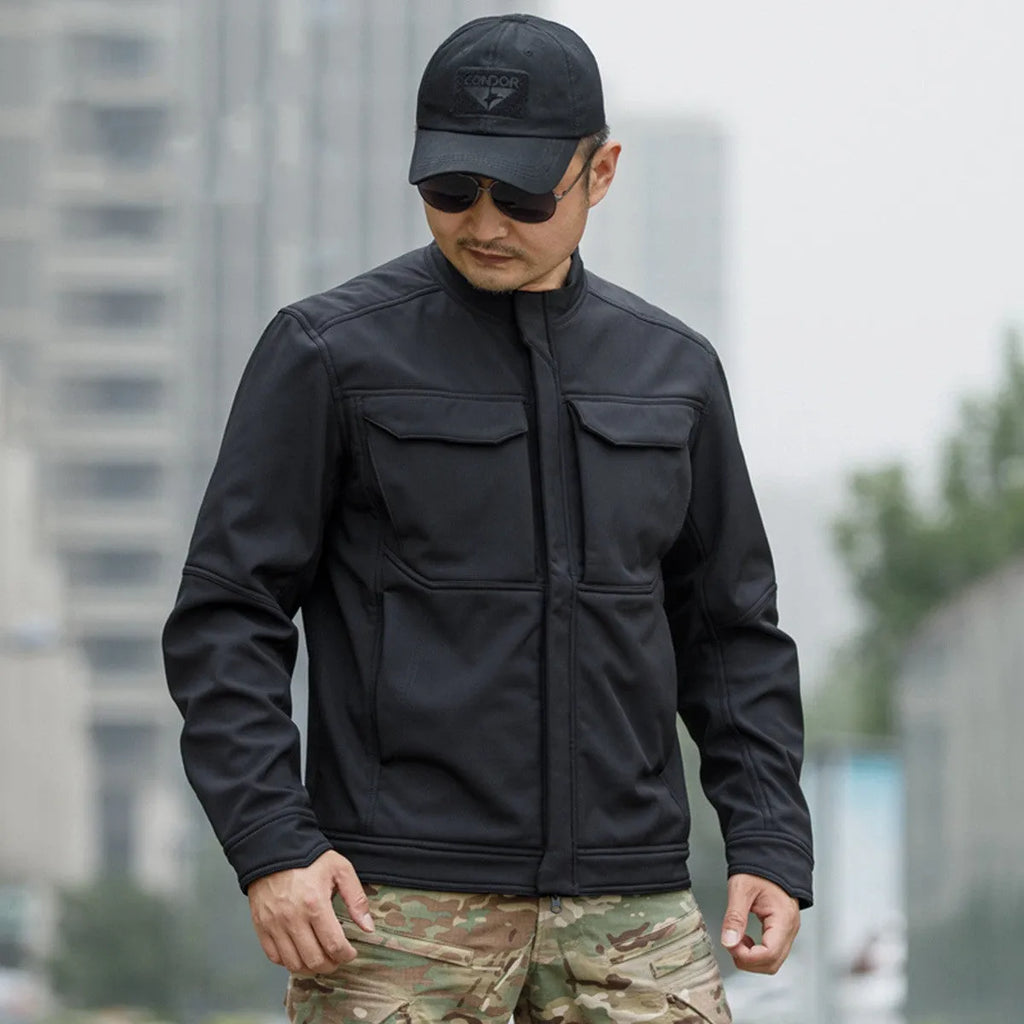 Bone Frog Peak Breaker black soft shell tactical jacket shown on model for mountaineering.