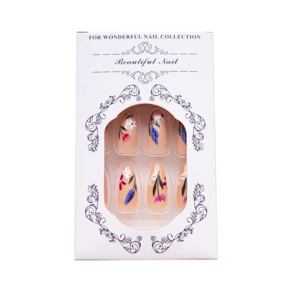 Almond-shaped removable nail art with floral patterns including roses and tulips