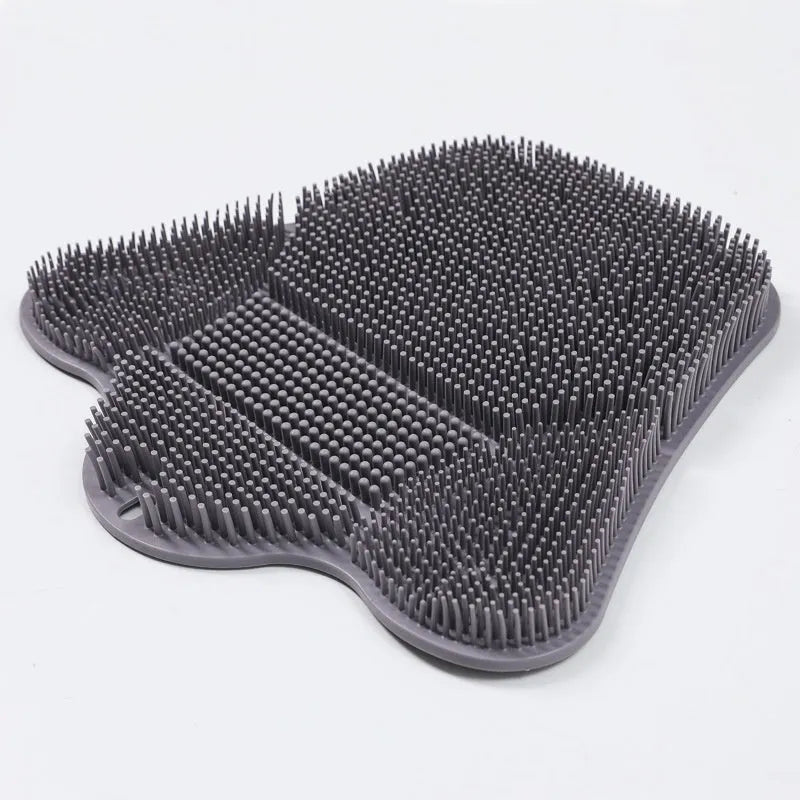 Blue silicone bath massage cushion with textured surface measuring 31 by 32 centimetres