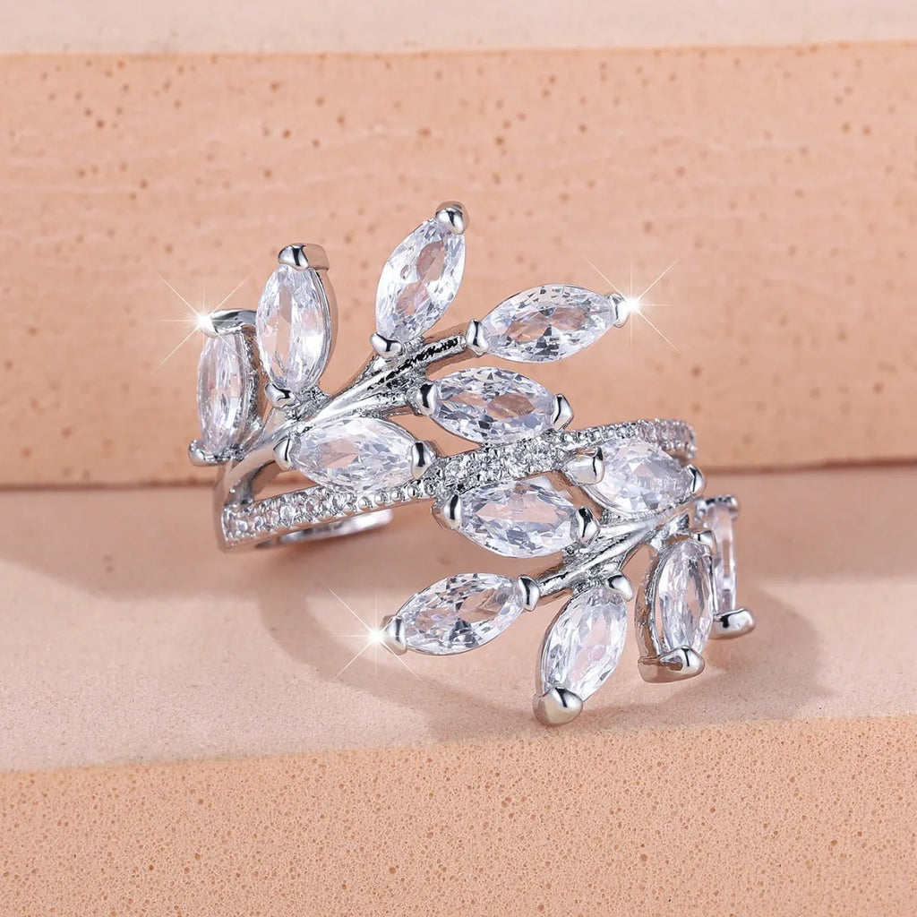 Adjustable copper leaf ring with zircon accents in multiple colour finishes including platinum white and rose gold