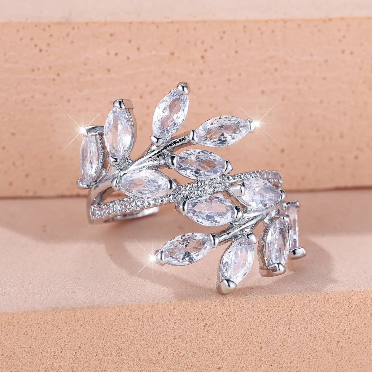 Adjustable copper leaf ring with zircon accents in multiple colour finishes including platinum white and rose gold