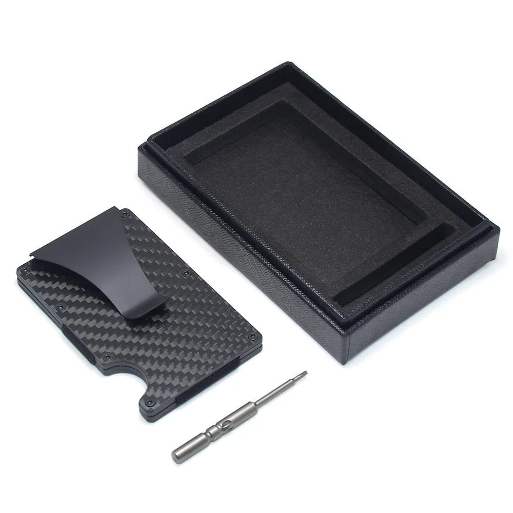 Carbon fibre geometric wallet card holder showing 8mm thickness holding multiple bank cards