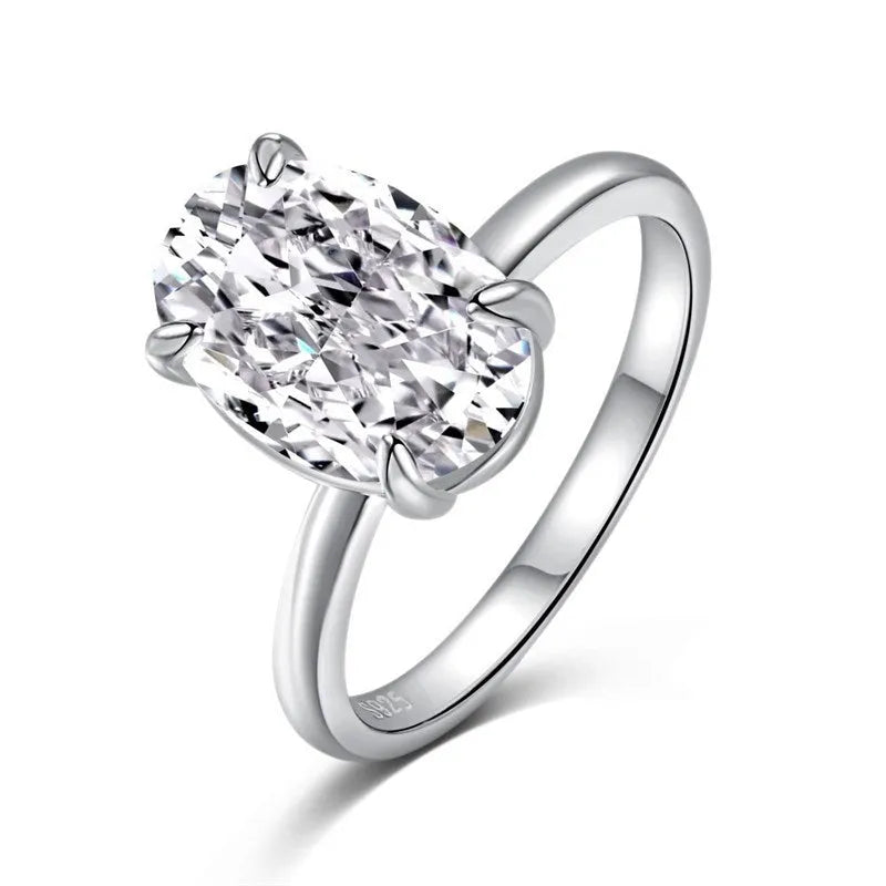 Oval women's ring with four-claw setting and oval gemstone in gold or silver finish