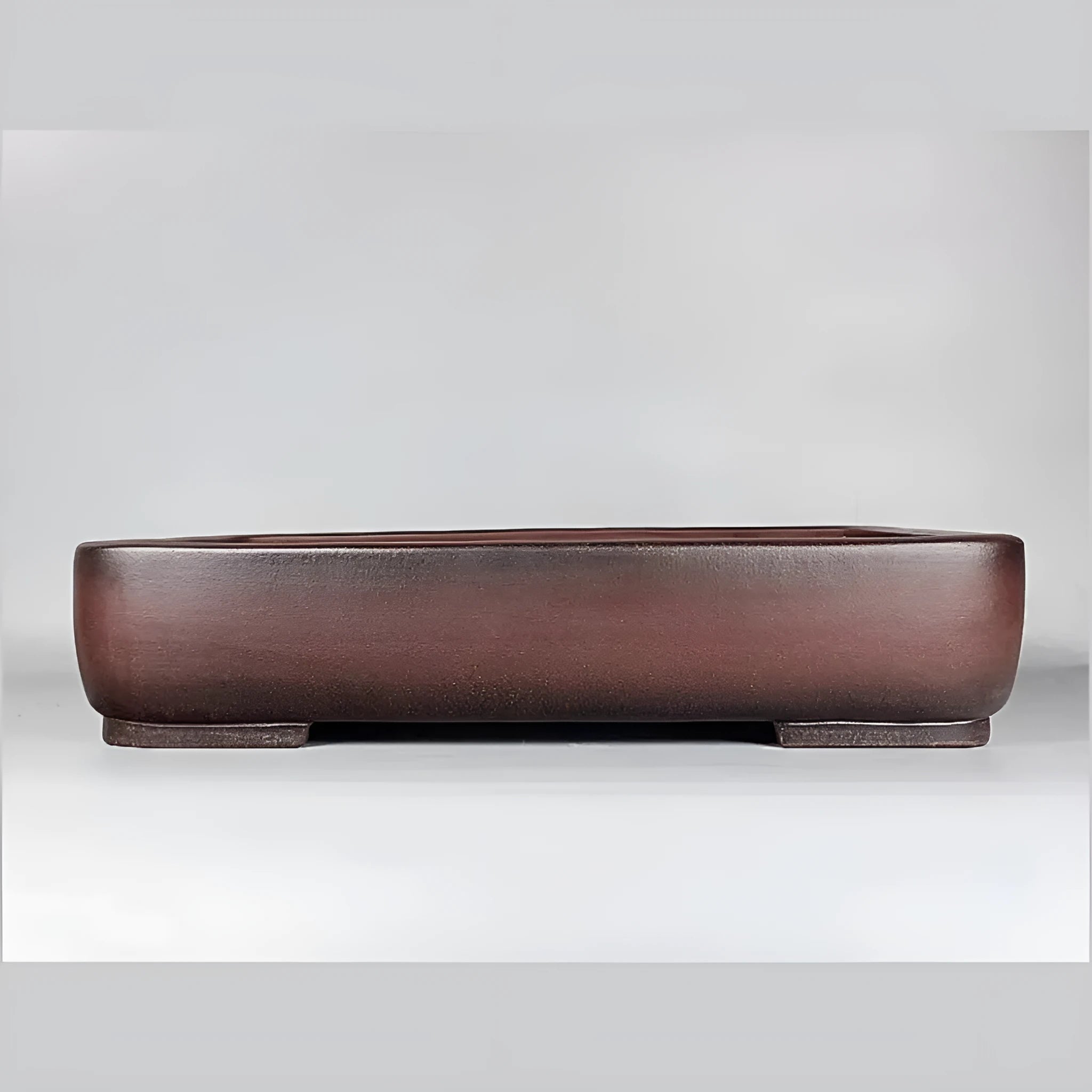 Handmade rectangular antique purple clay flower pot showing its size and textured finish.