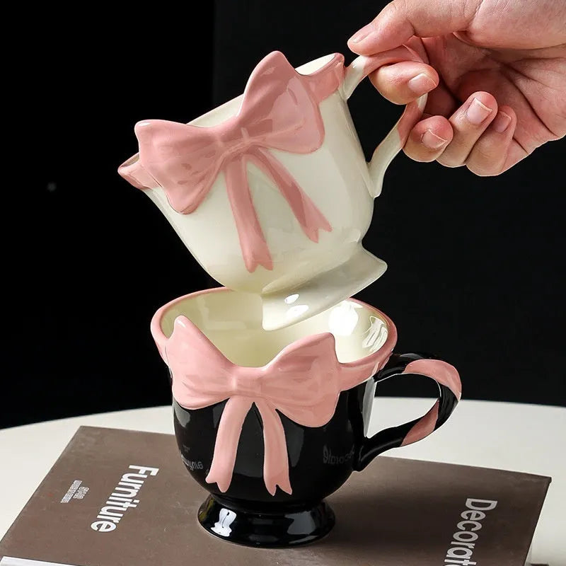 Ceramic mug with heart bow design in black pink or white powder, 301-400ml capacity