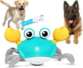 Blue or red electronic crab dog toy with lights, shown crawling, with a USB charging cable