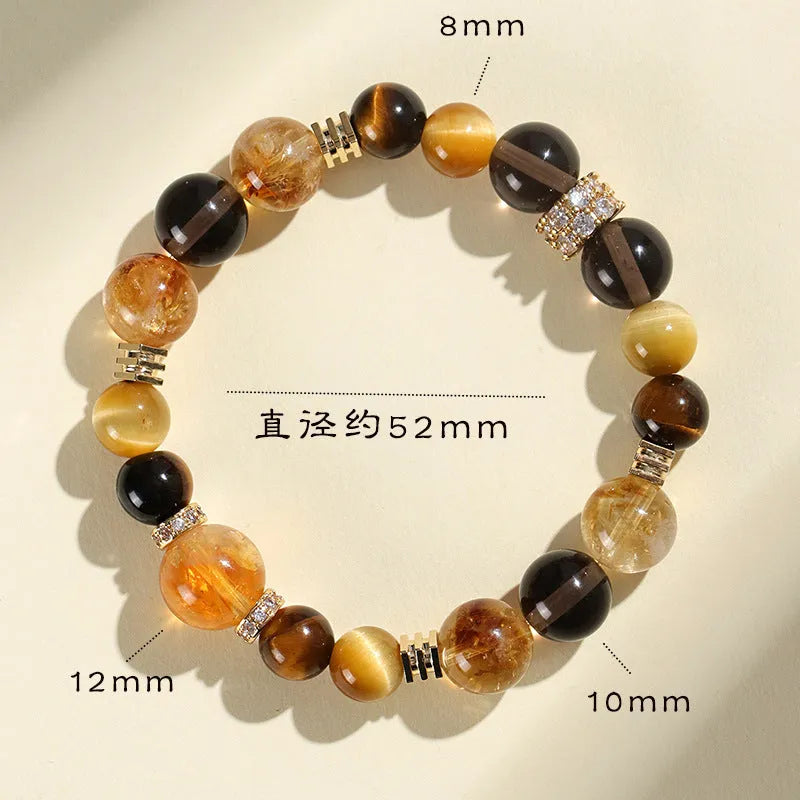 Natural yellow crystal bead bracelet with 10mm Jinba beads on wrist