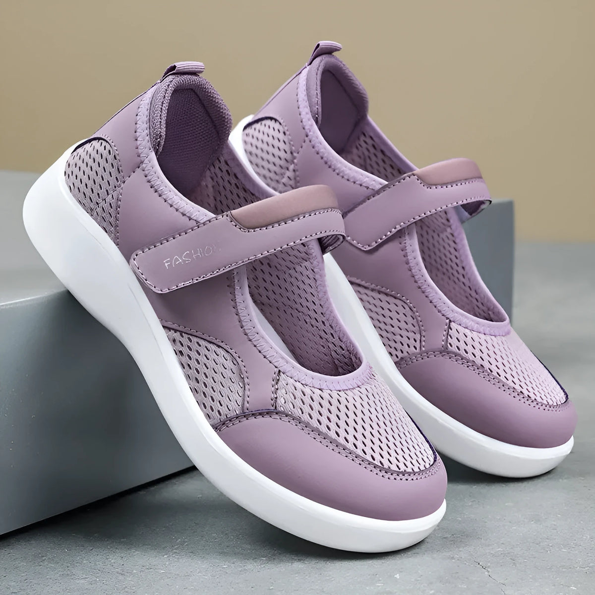 Women's low-top casual shoes in mesh fabric with Velcro strap, shown in multiple colours.