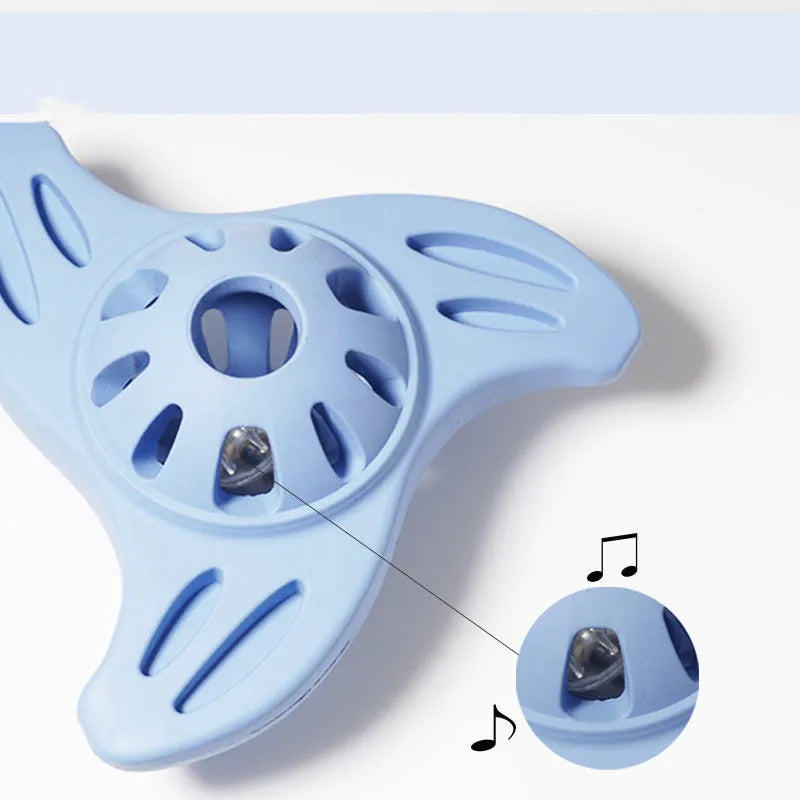 Blue boomerang-shaped dog toy with molar texture for medium and large breed dogs