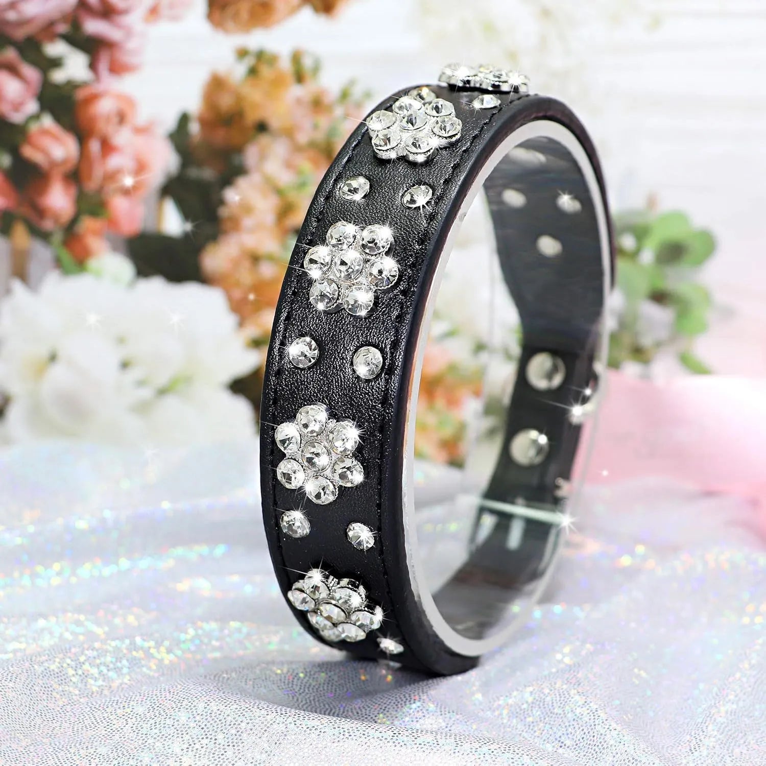 Adjustable black PU leather dog collar with rhinestone flower pattern and metal studs for small dogs.
