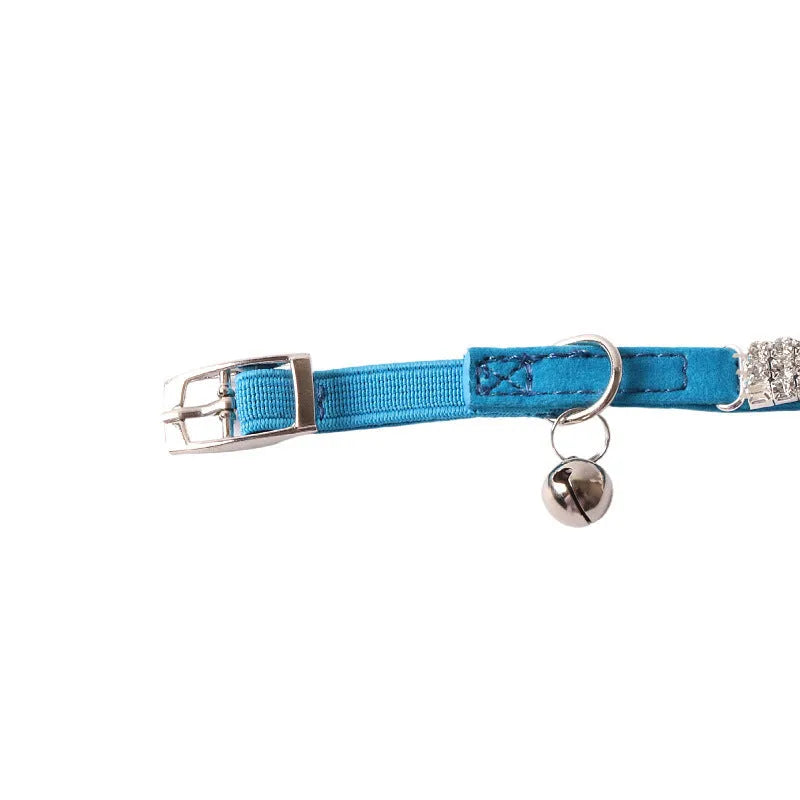 Elastic flannel cat collar with buckle fastening shown in one of six available colours.