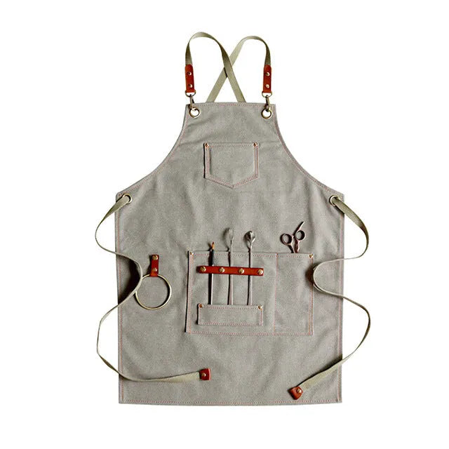 Canvas apron with cross-strap back design in camel colour for work protection