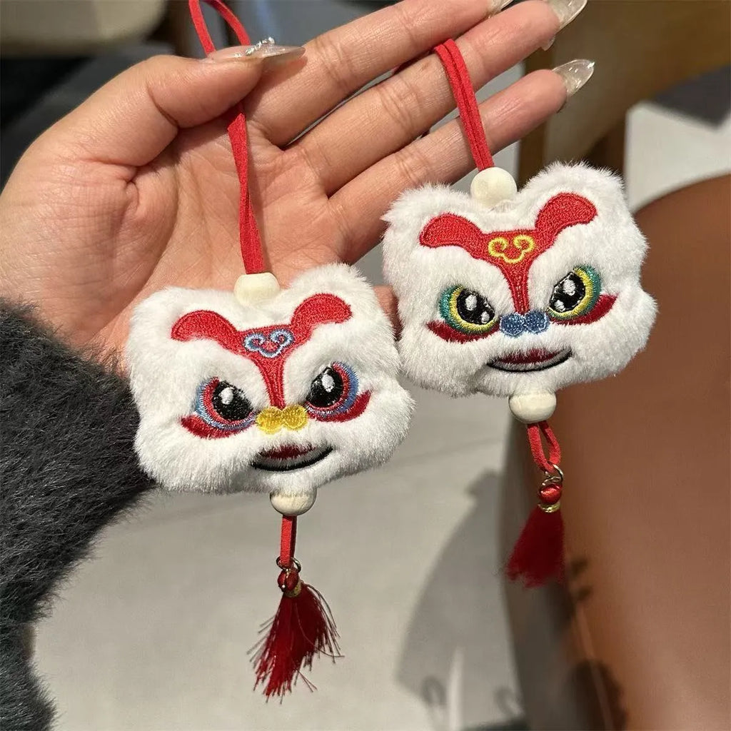 Blue and yellow handmade plush lion tassel ornament keychain with star stone decorative details
