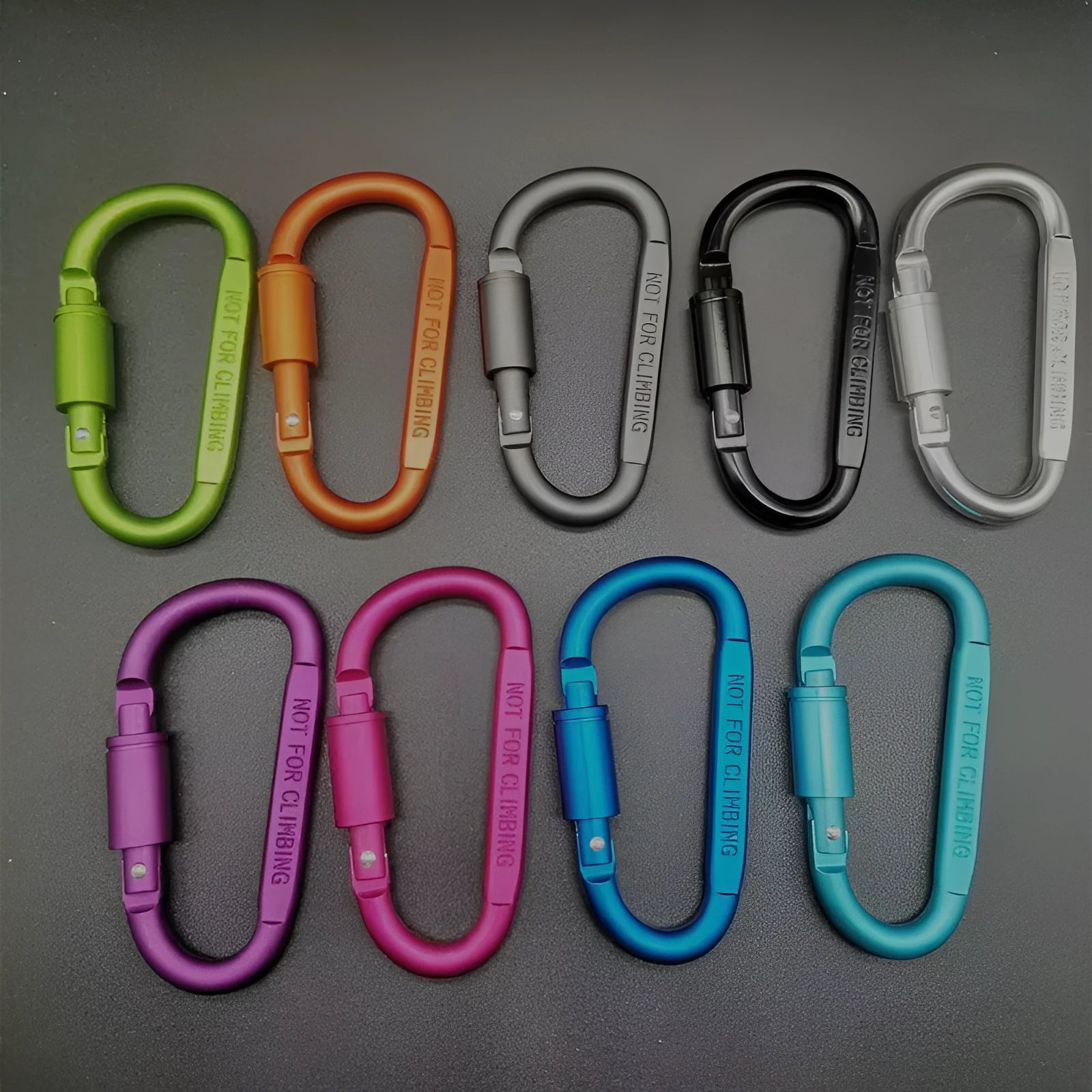 Aluminium D-shaped locking climbing carabiner with a flat 8cm design shown in silver.
