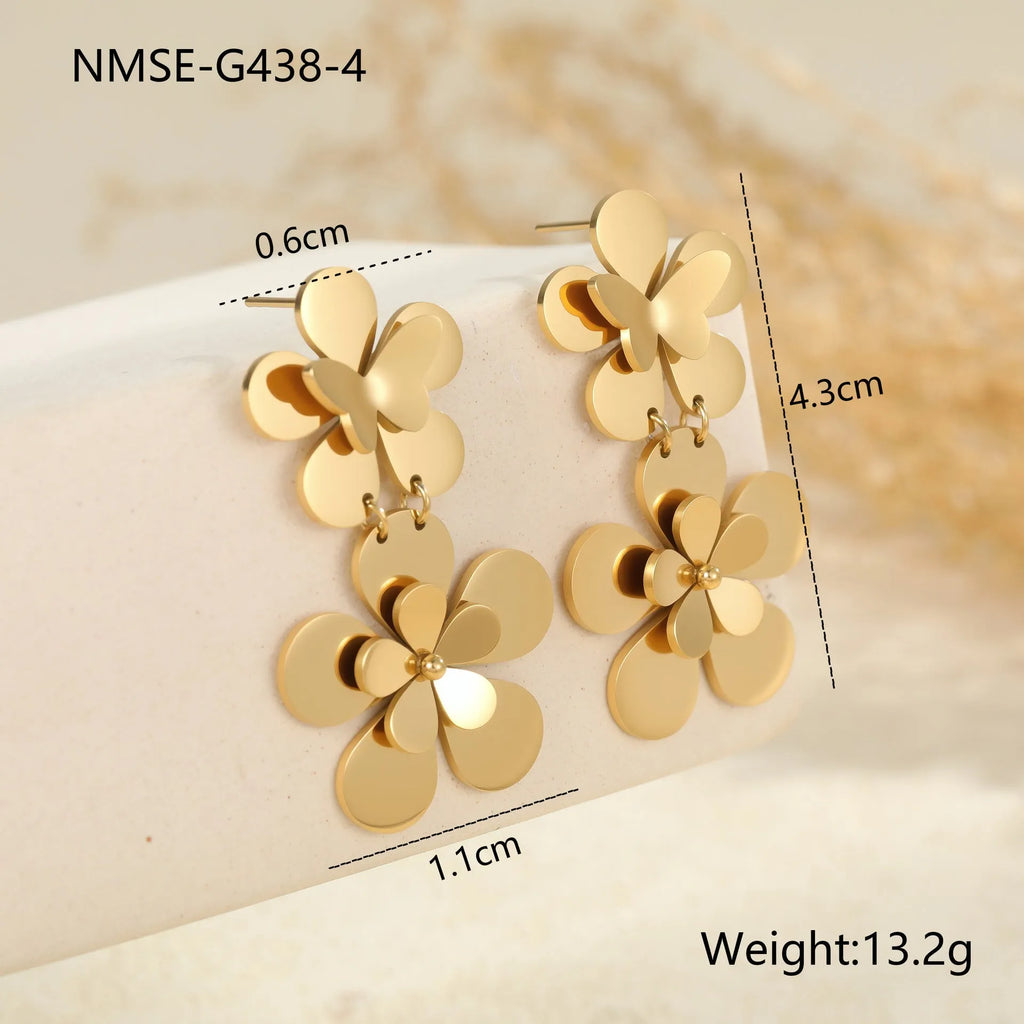 Gold floral butterfly design stainless steel earrings for women with geometric elements