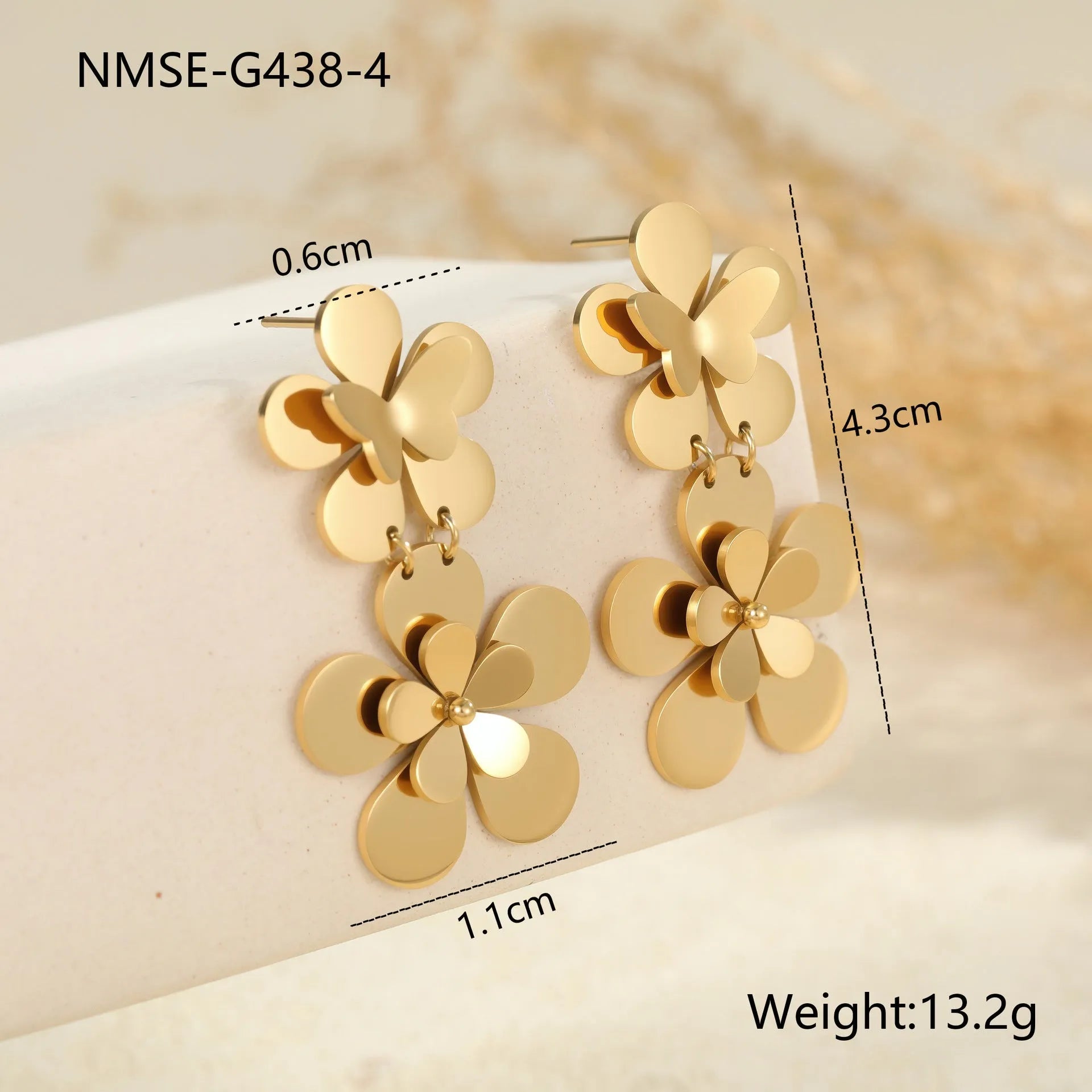 Gold floral butterfly design stainless steel earrings for women with geometric elements