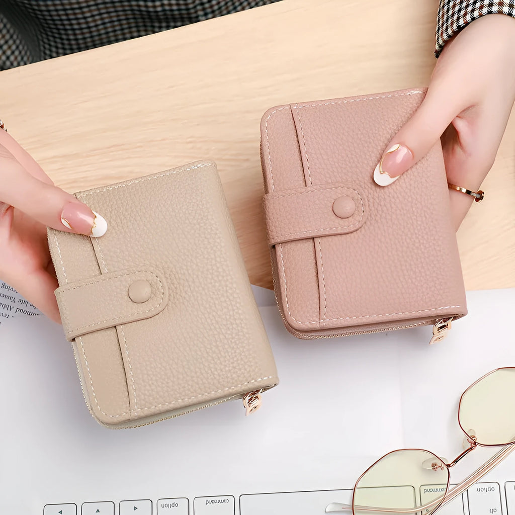 Beige women's short pu wallet with lychee pattern and sewing thread detail.