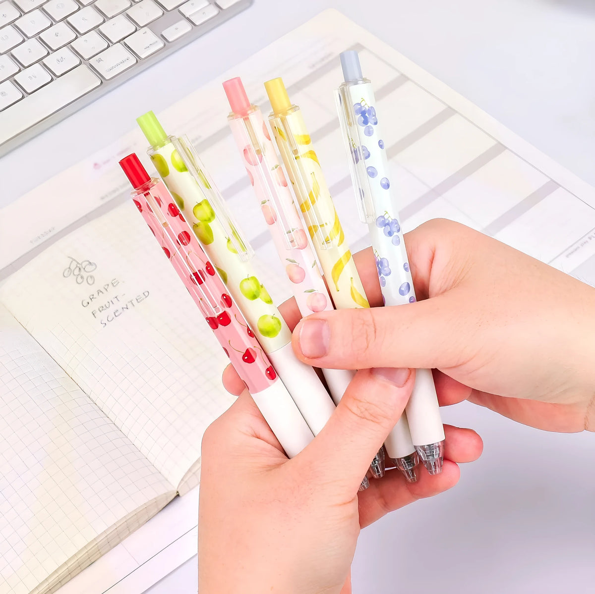 Three fruit-scented pressurised pens with 0.5mm quick-drying refills in random assortment