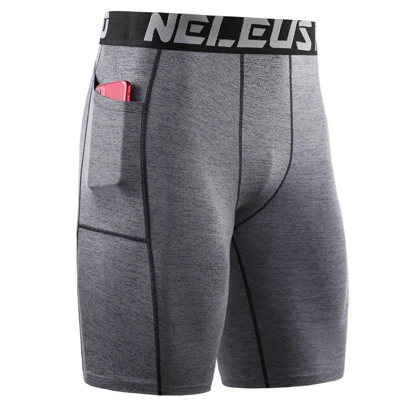 Man wearing dark blue polyester milk silk sports shorts for running or fitness.