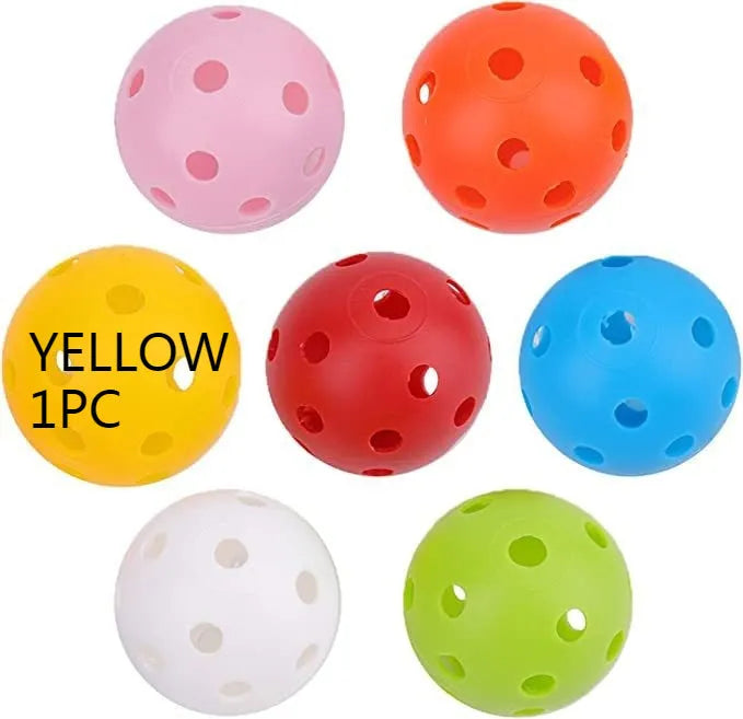 Multi-colour 42mm PE golf practice balls with 26-hole design in net pocket