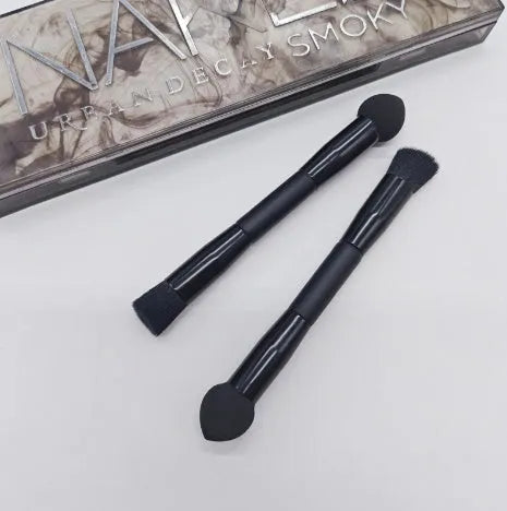 Double-headed concealer brush with black wooden handle and a miter sponge