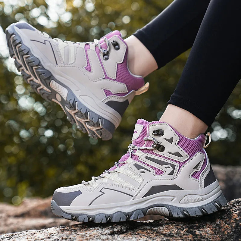 High-top hiking sneaker in light brown with front lace-up closure and natural rubber sole.