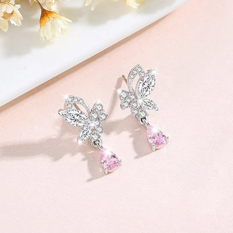 Butterfly crystal stud earrings in silver with decorative design