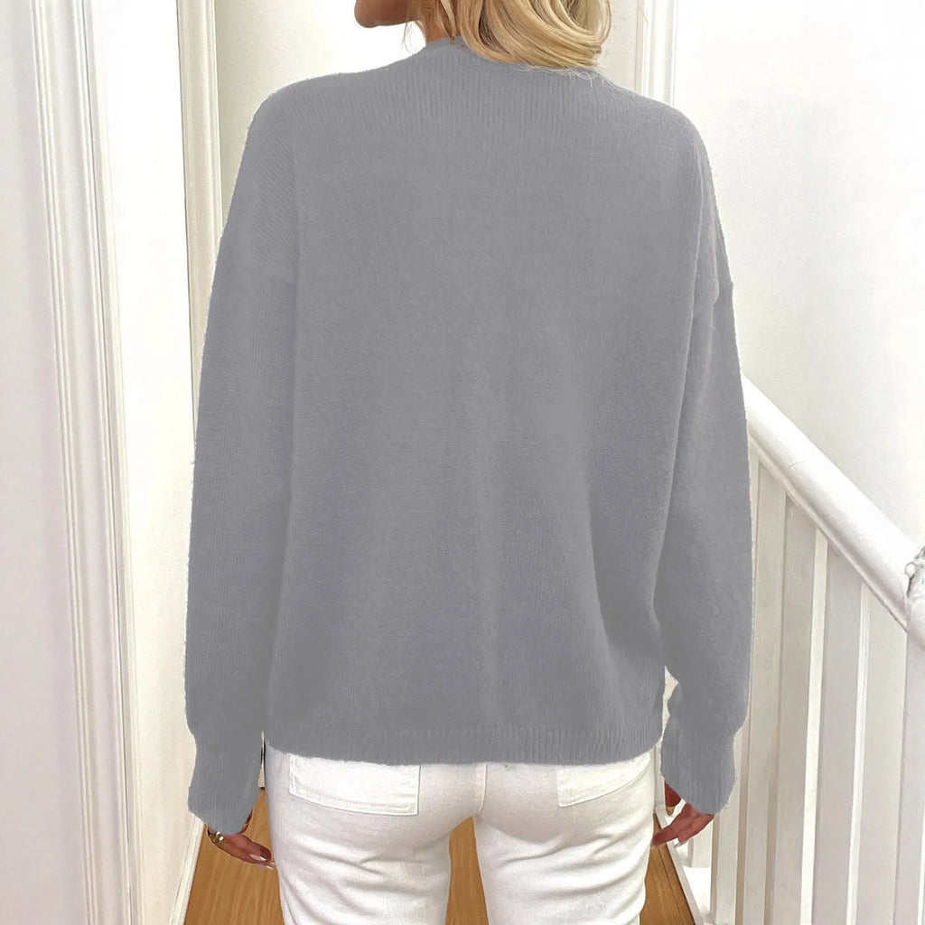 Women's grey deer plush sweater coat with princess sleeves and irregular hemline on hanger