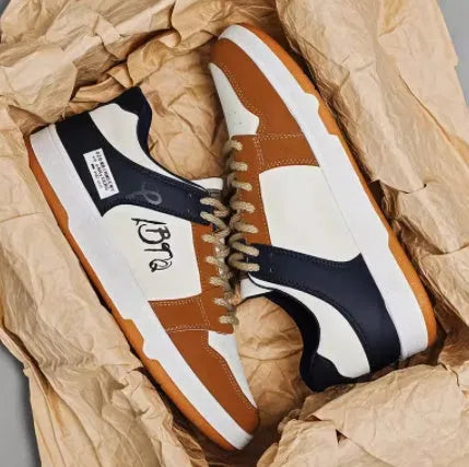 Casual lace-up sneakers in simple plain design with youth fashion styling, showing available colour options