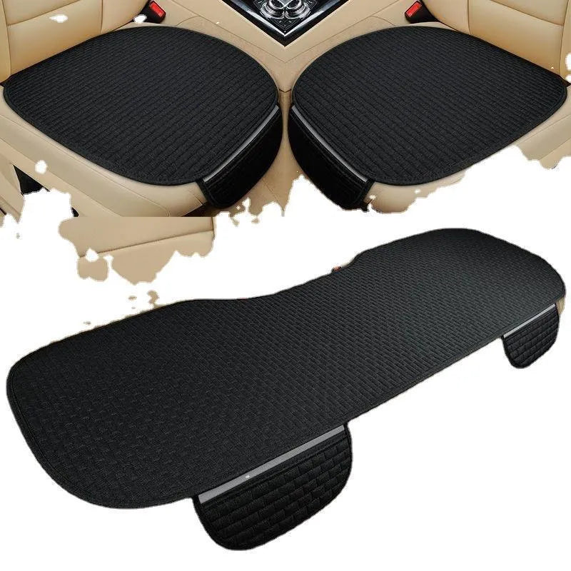 Linen car cushion set in classic plaid pattern showing three colour options: black and red, coffee and cream