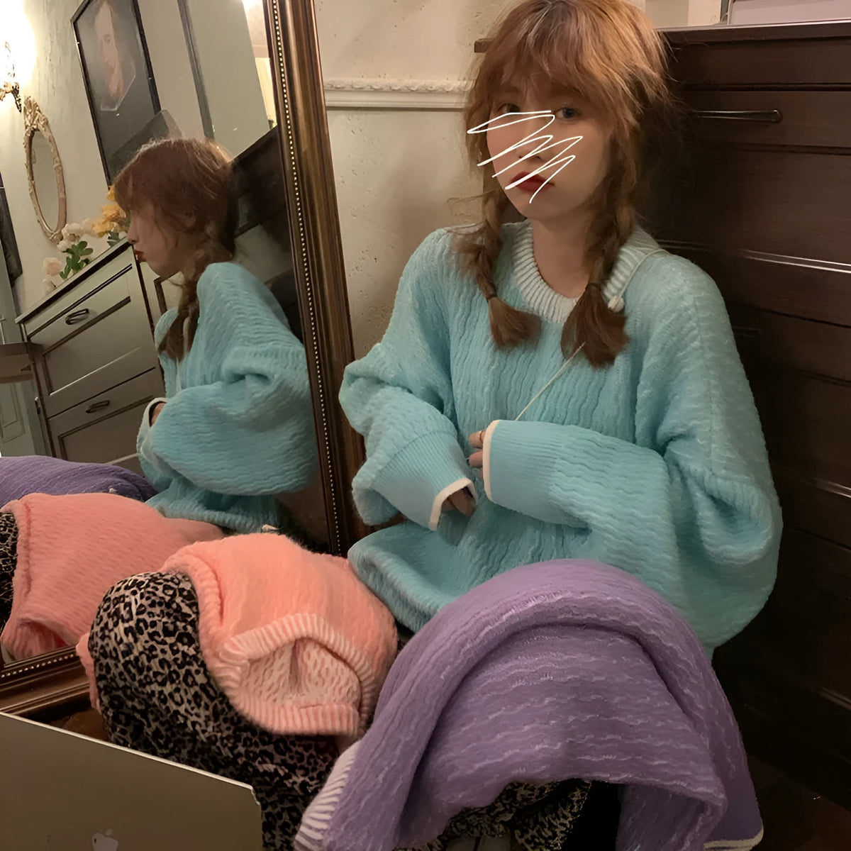 Women's loose retro pullover sweater in lake blue colour showing regular sleeves and medium thickness fabric
