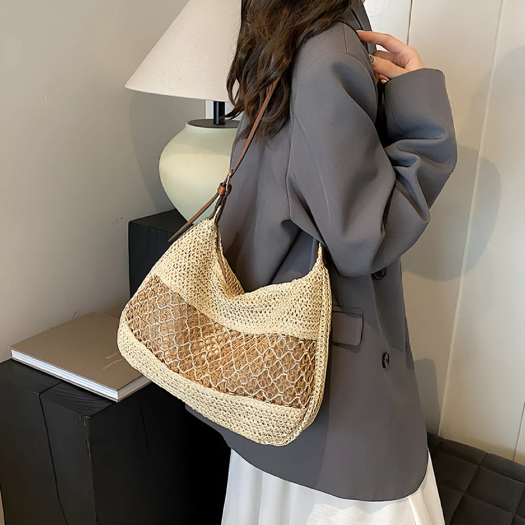 Women's straw cross body bag in horizontal square shape with sandwich pockets, shown in khaki colour