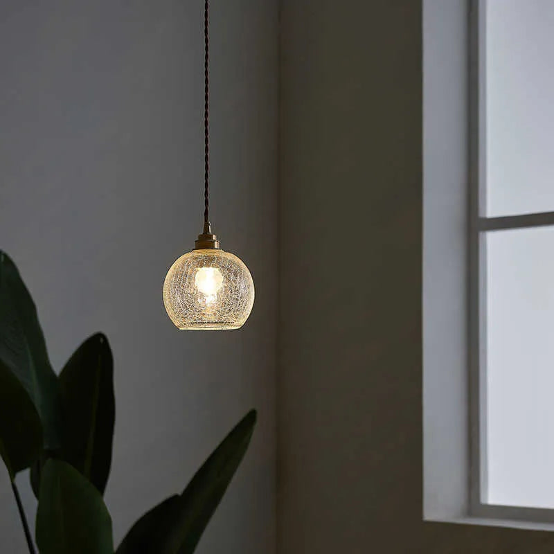 Brass electroplated copper chandelier with glass ball shade measuring 17.5cm diameter