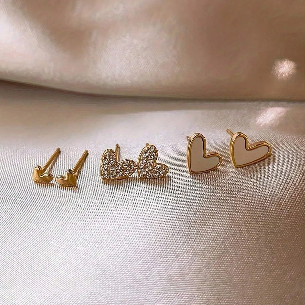 Women's fashion heart earrings set with 3 pairs in gold, black, and pink alloy electroplated colours