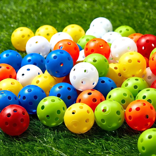 Multi-colour 42mm PE golf practice balls with 26-hole design in net pocket