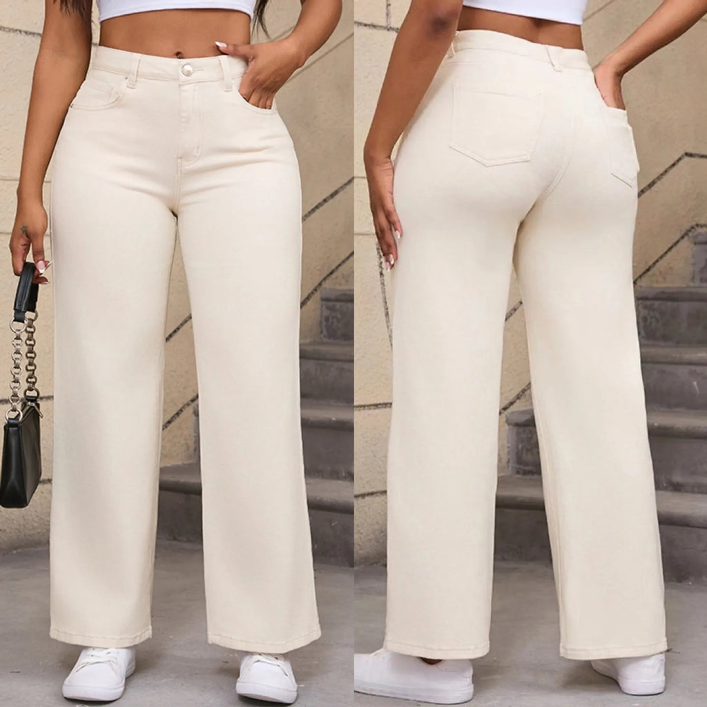 Women's high-waisted straight leg wide jeans in apricot colour on a hanger.