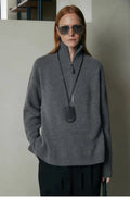 Women's wool bandage top with loose lapels in black or mountain rain grey, long sleeve pullover
