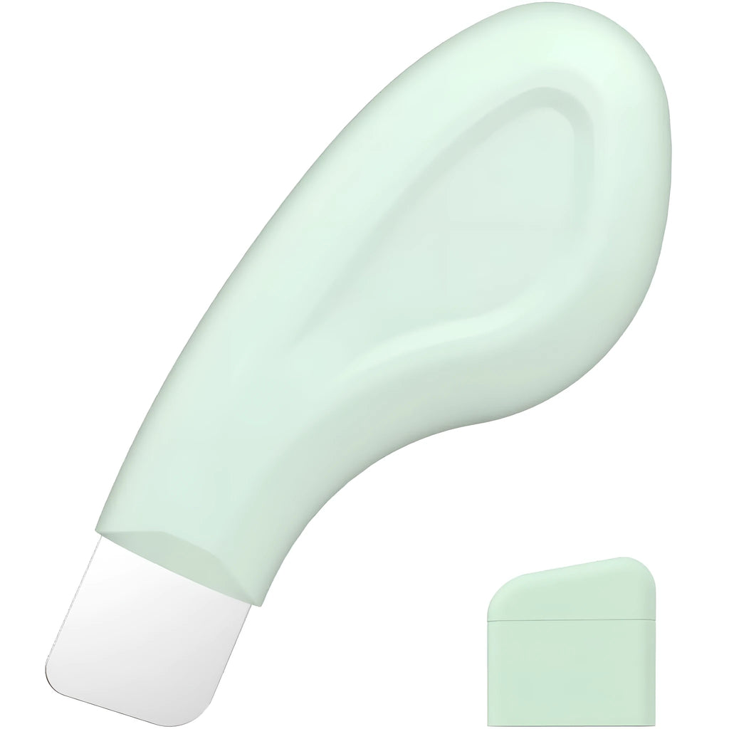 Green stainless steel facial pore scraper tool with a non-slip handle for blackhead removal.