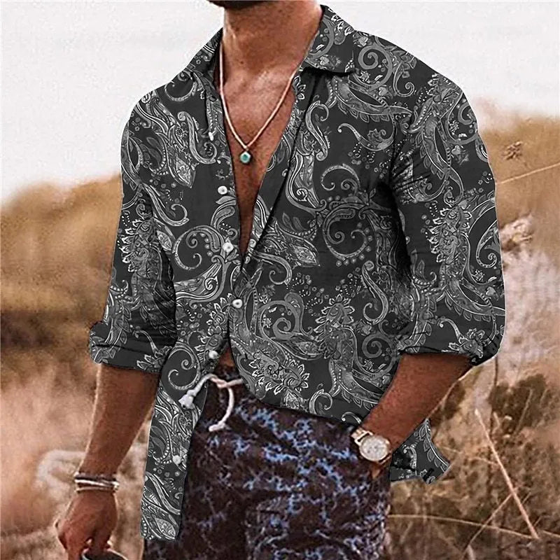 Man wearing a loose-fit long-sleeved shirt with a colourful 3D digital printed flower pattern.