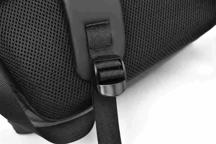 Waterproof PU leather laptop backpack in black, blue, and grey colour options