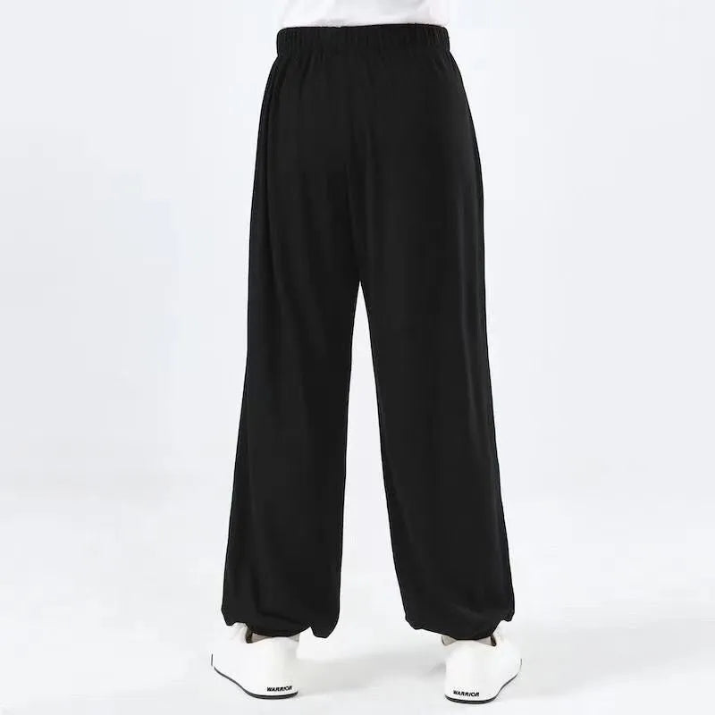 Children's black Lycra practice pants for Sanda martial arts training with high elasticity fabric