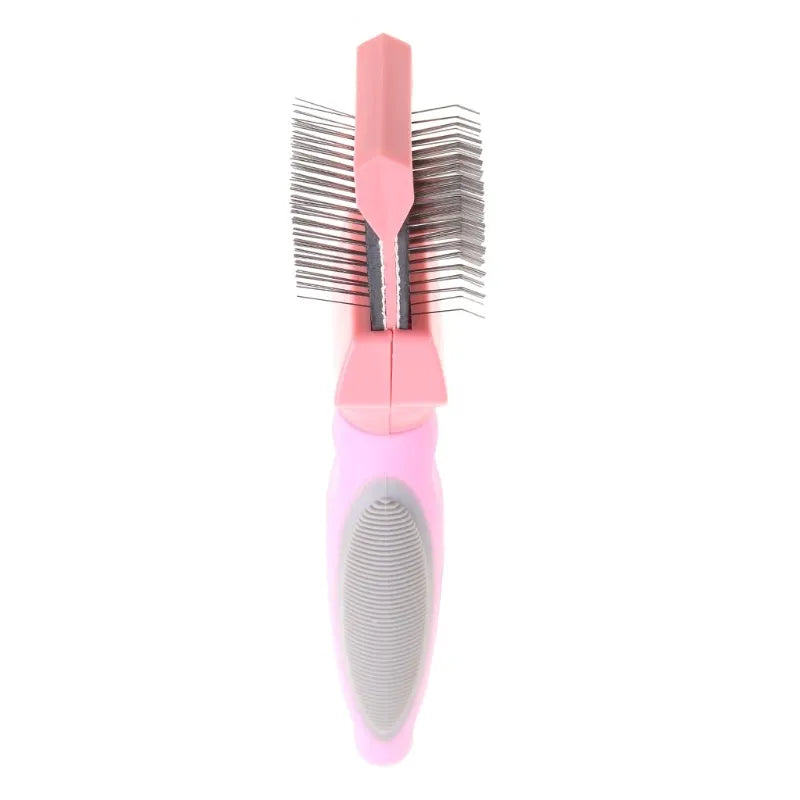 Blue double-sided pet brush with stainless steel pins next to a pink large version on a wooden surface.