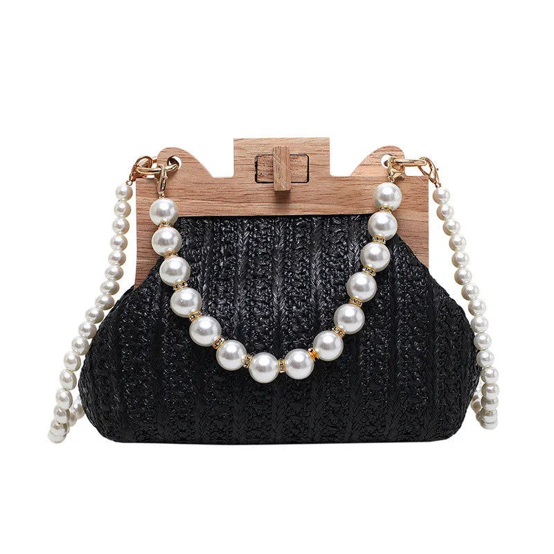 Women's straw shoulder bag with pearl chain detail in horizontal square shape