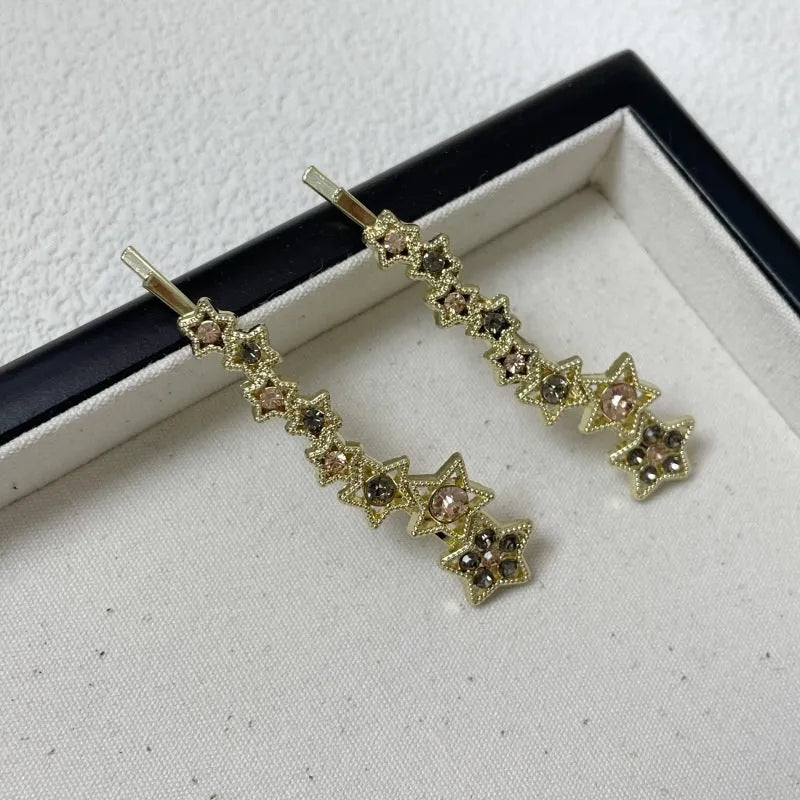 Gold electroplated Korean style bangs barrette with side clip and rhinestone star decoration
