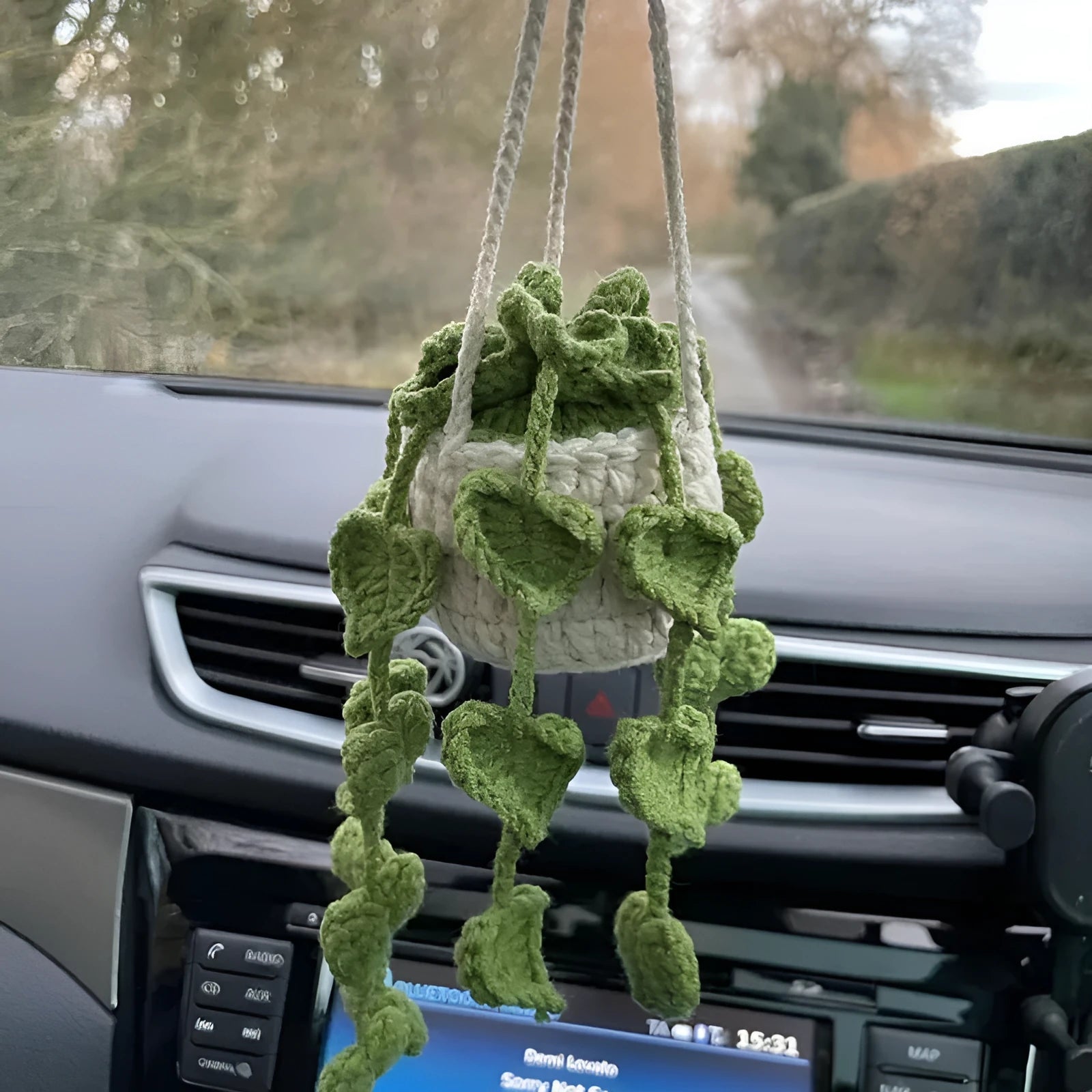 Green and white knitted wool car plant decoration hanging from 25cm white rope