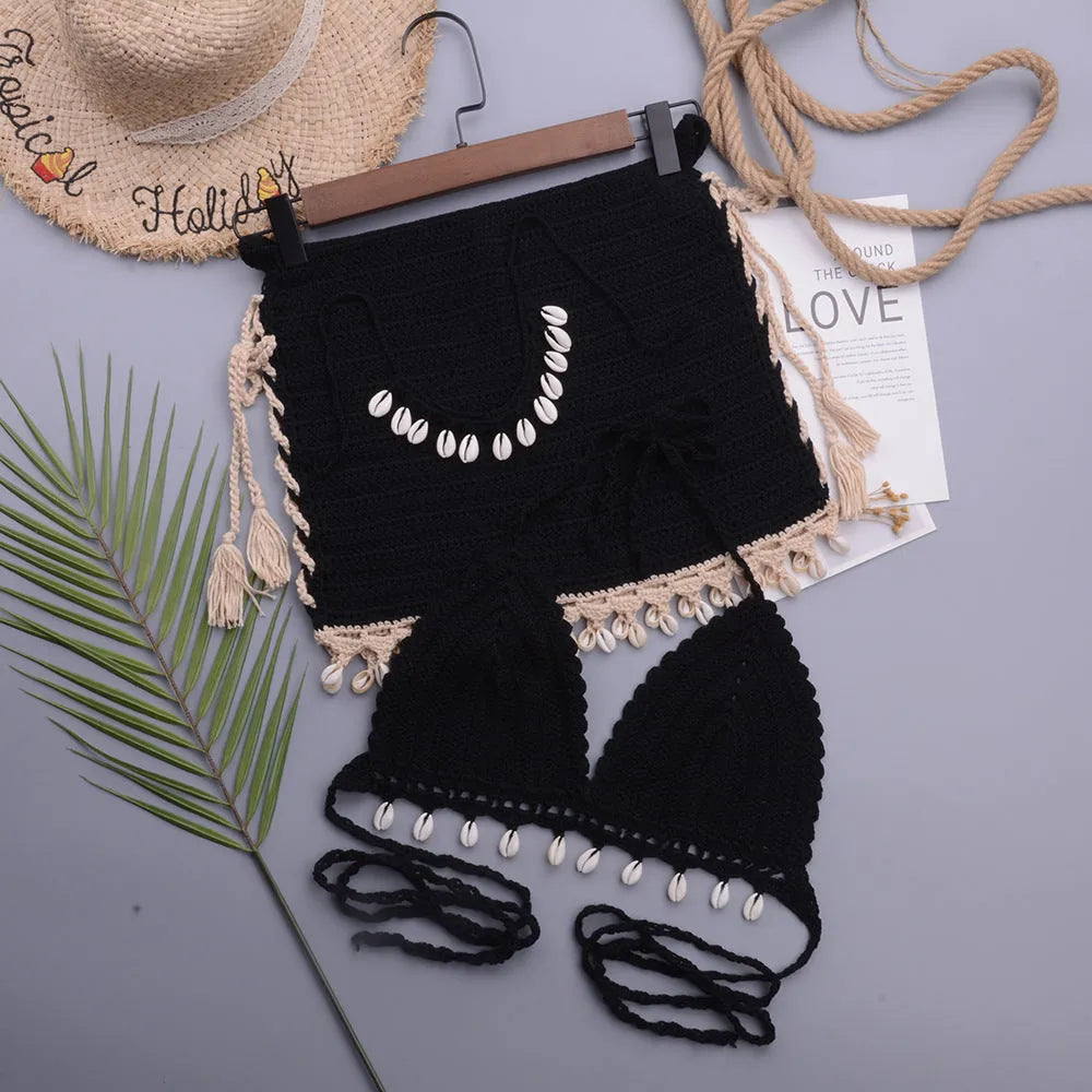 Women's handmade shell lace-up split swimsuit in a cotton blend fabric, shown in black colour.