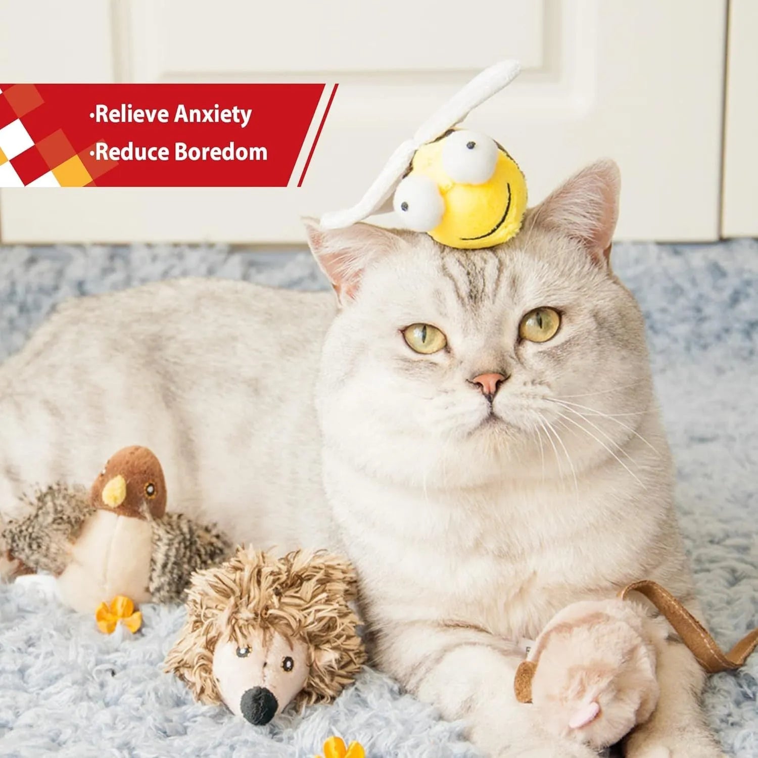 Yellow bee-shaped interactive cat toy with motion-activated squeaking function for indoor feline play
